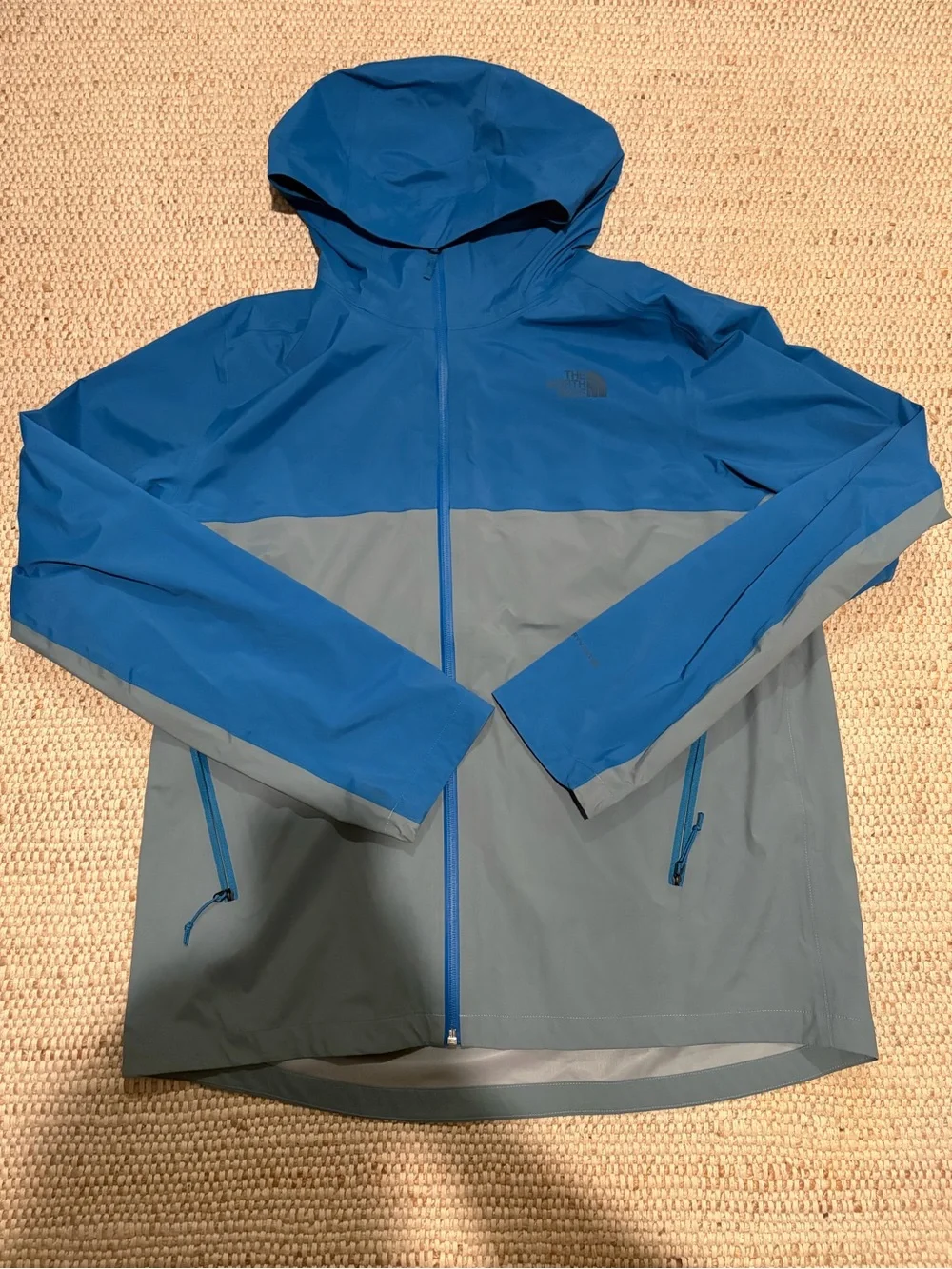 The North Face Blue and Gray Hooded Rain Jacket